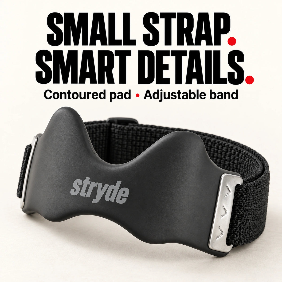 Black Stryde strap with a contoured pad and adjustable band, shown with product detail text
